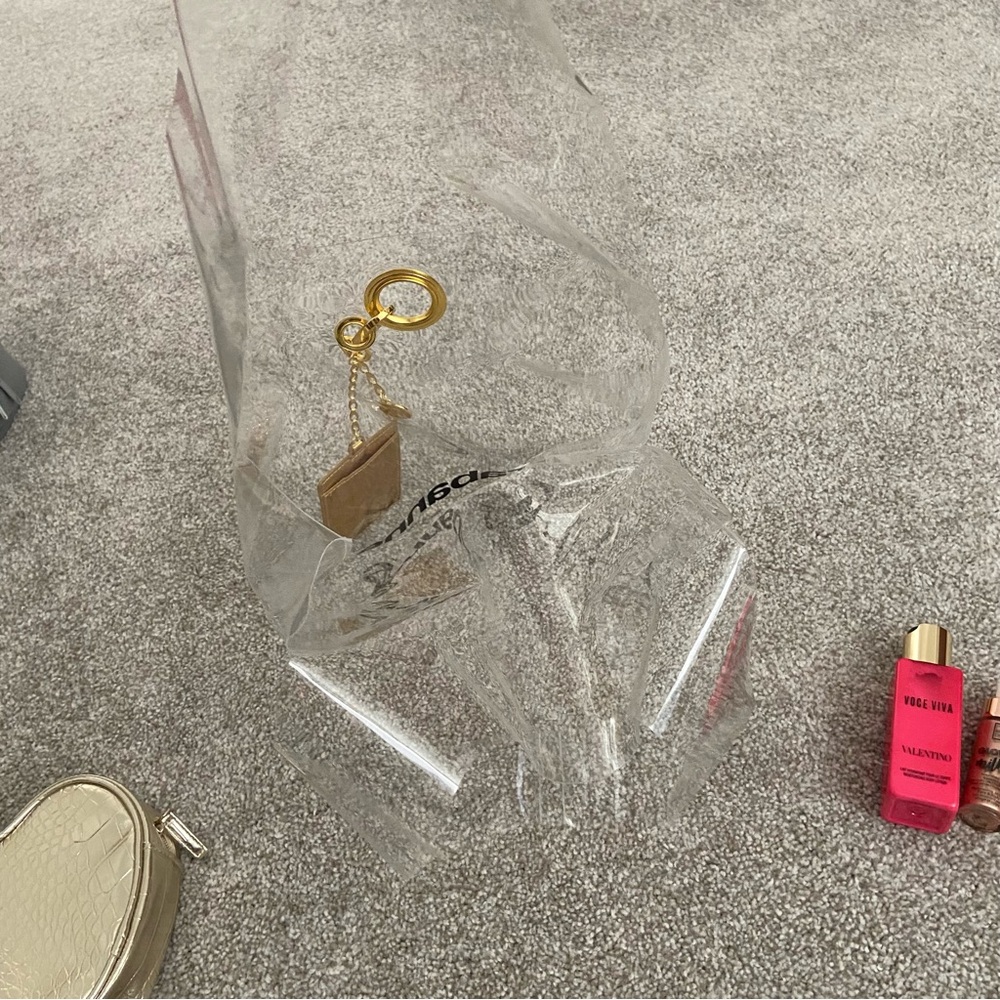 5 items - Rabanne Transparent Tote with Gold Heart Pouch, lotion and more! ⭐️ - Picture 6 of 12